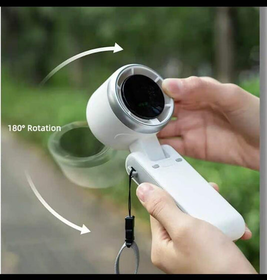 Bien sûr ! Voici une suggestion de titre et de description pour ce produit :  Titre : Mini Ventilateur Portable Sans Pale avec Affichage Digital LED - Silencieux & Rechargeable USB